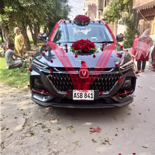 Red Ribbon & Roses Luxury Wedding Car Decoration – Black SUV